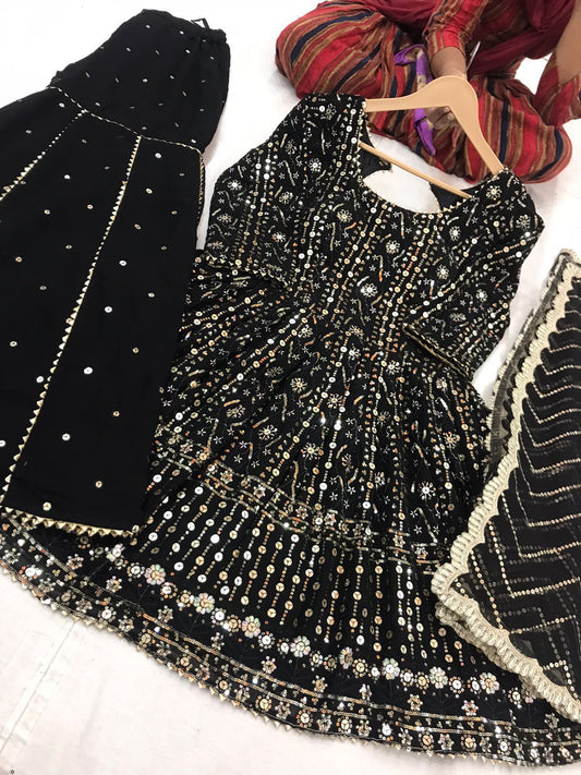 peplum top and  Embroidered Sharrara Suit