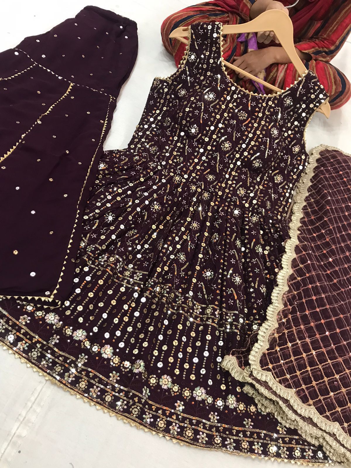 peplum top and  Embroidered Sharrara Suit